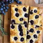 Sourdough Blueberry Focaccia: The Most Stunning Sweet Bread Recipe to Bake Now 8 Freshly baked sourdough blueberry focaccia close-up