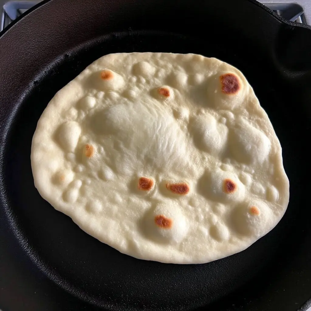 Sourdough Naan: The Softest Flatbread Recipe with Tangy Twist | DishRCP 8 Ingredients for sourdough naan on wooden counter