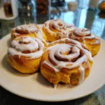 Pumpkin Shaped Cinnamon Rolls with Cream Cheese Frosting Delight! 3 Pumpkin Shaped Cinnamon Rolls with Cream Cheese Frosting